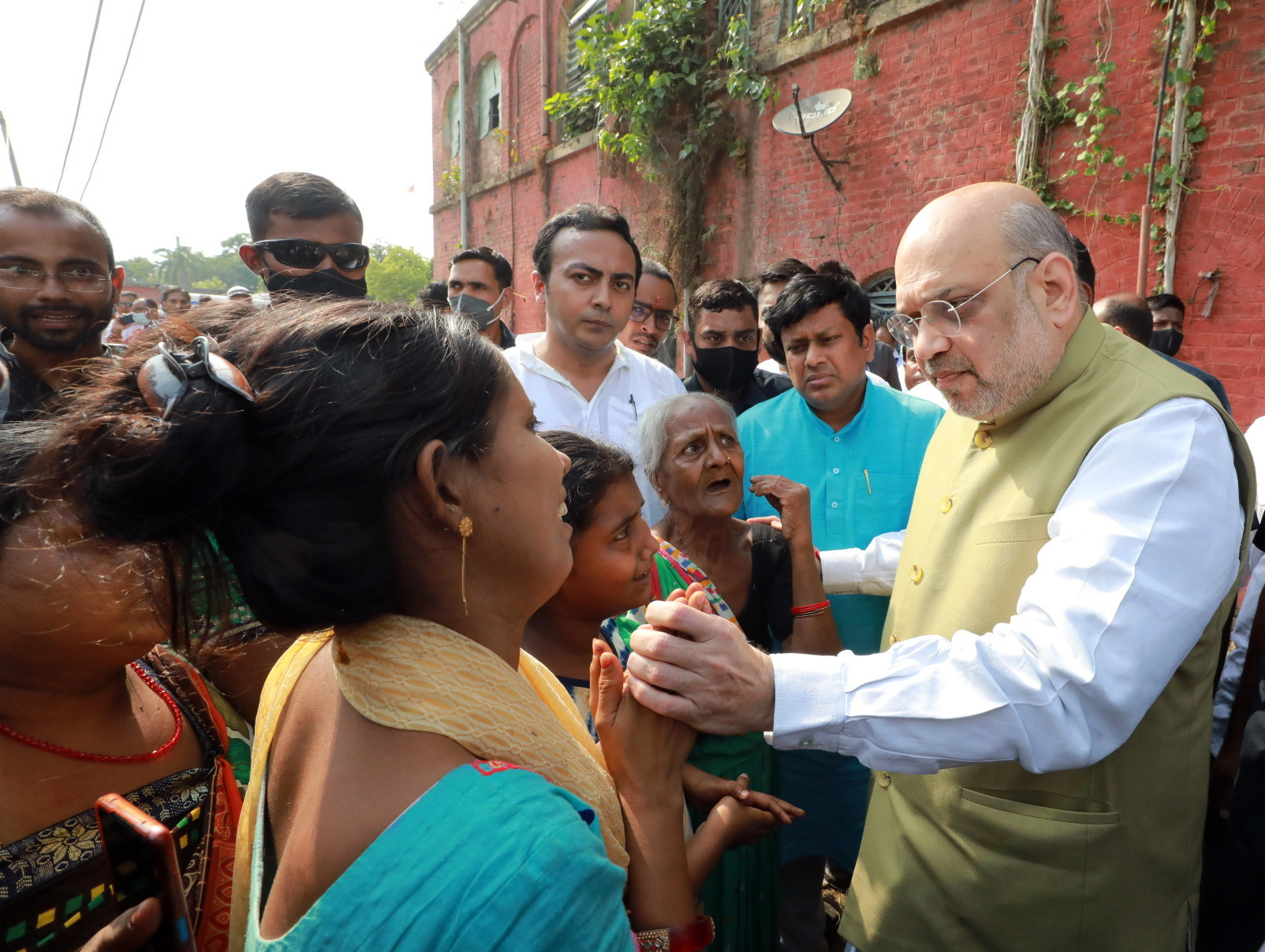 Union Home Minister Amit Shah meets with family members of Bharatiya Janata Yuva Morcha (BJYM) worker Arjun Chowrasia,