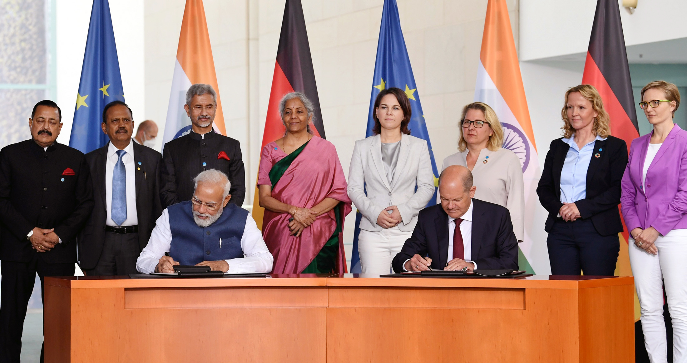 Prime Minister Narendra Modi and German Chancellor Olaf Scholz signing the agreement