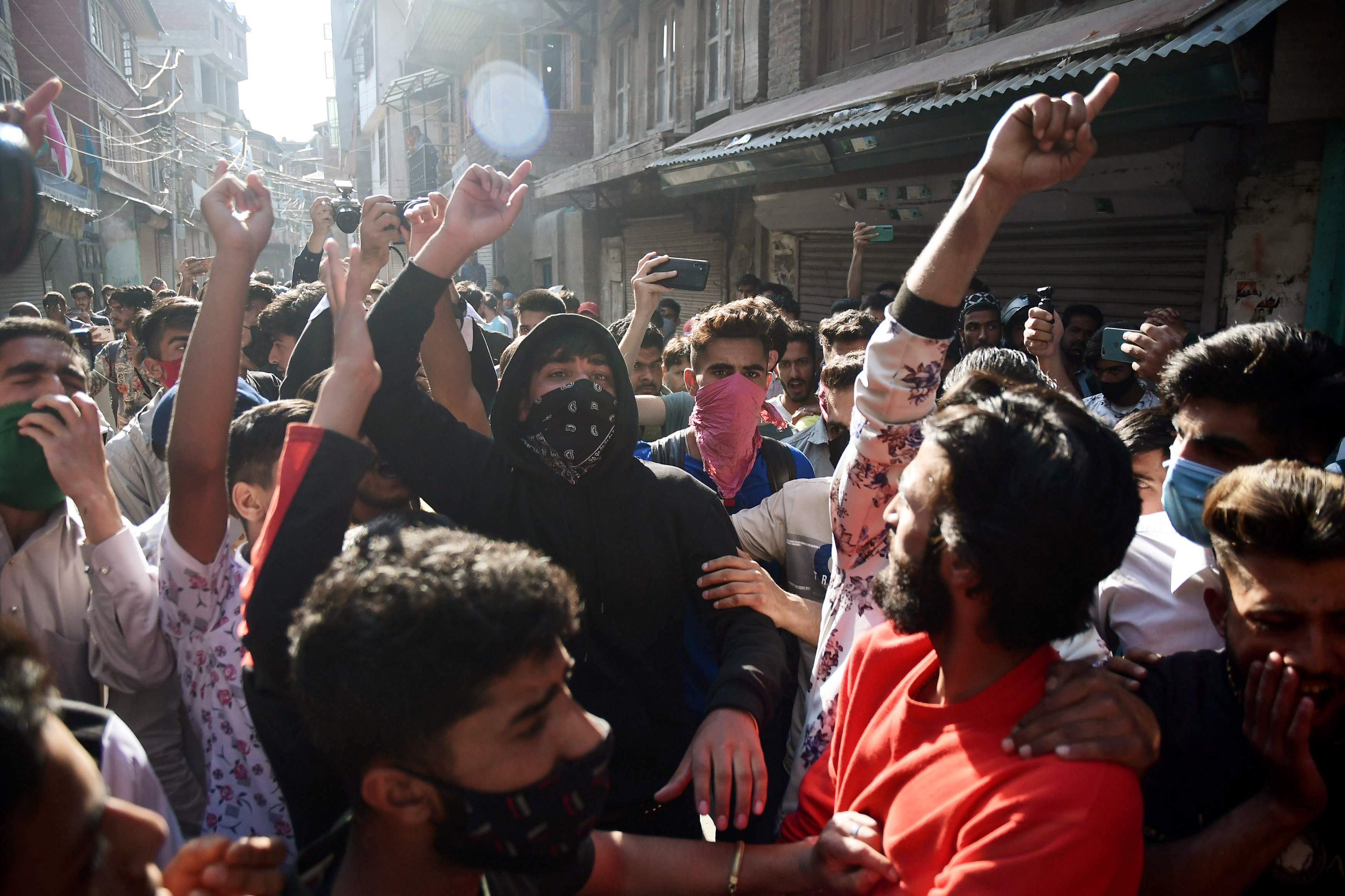 Protestors shout slogans during a protest