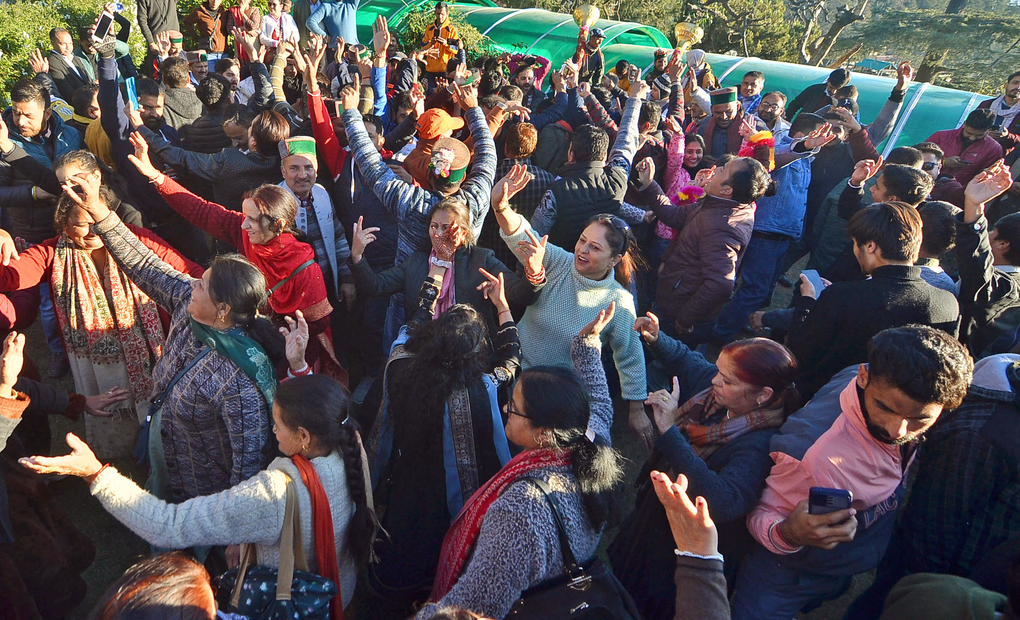 Congress supporters celebrate the party's victory in the Himachal Pradesh Assembly polls