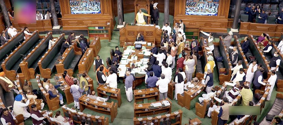 Opposition MPs sloganeering in the Well of Lok Sabha during the Budget Session of Parliament