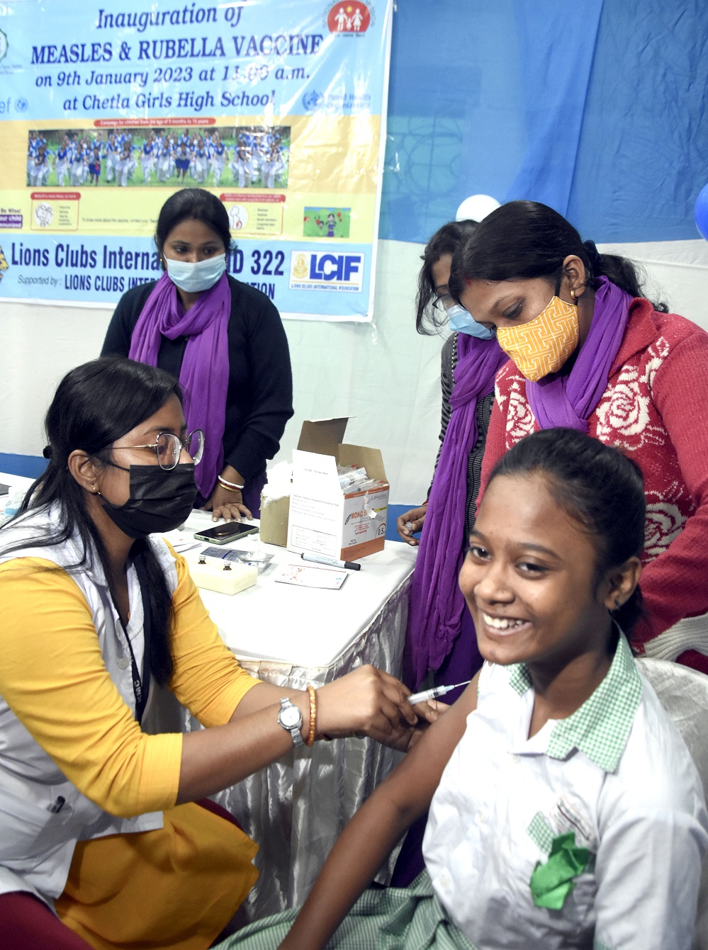 A health worker inoculates Measles and Rubella vaccine to a student during a state-wide MR vaccination drive in Kolkata