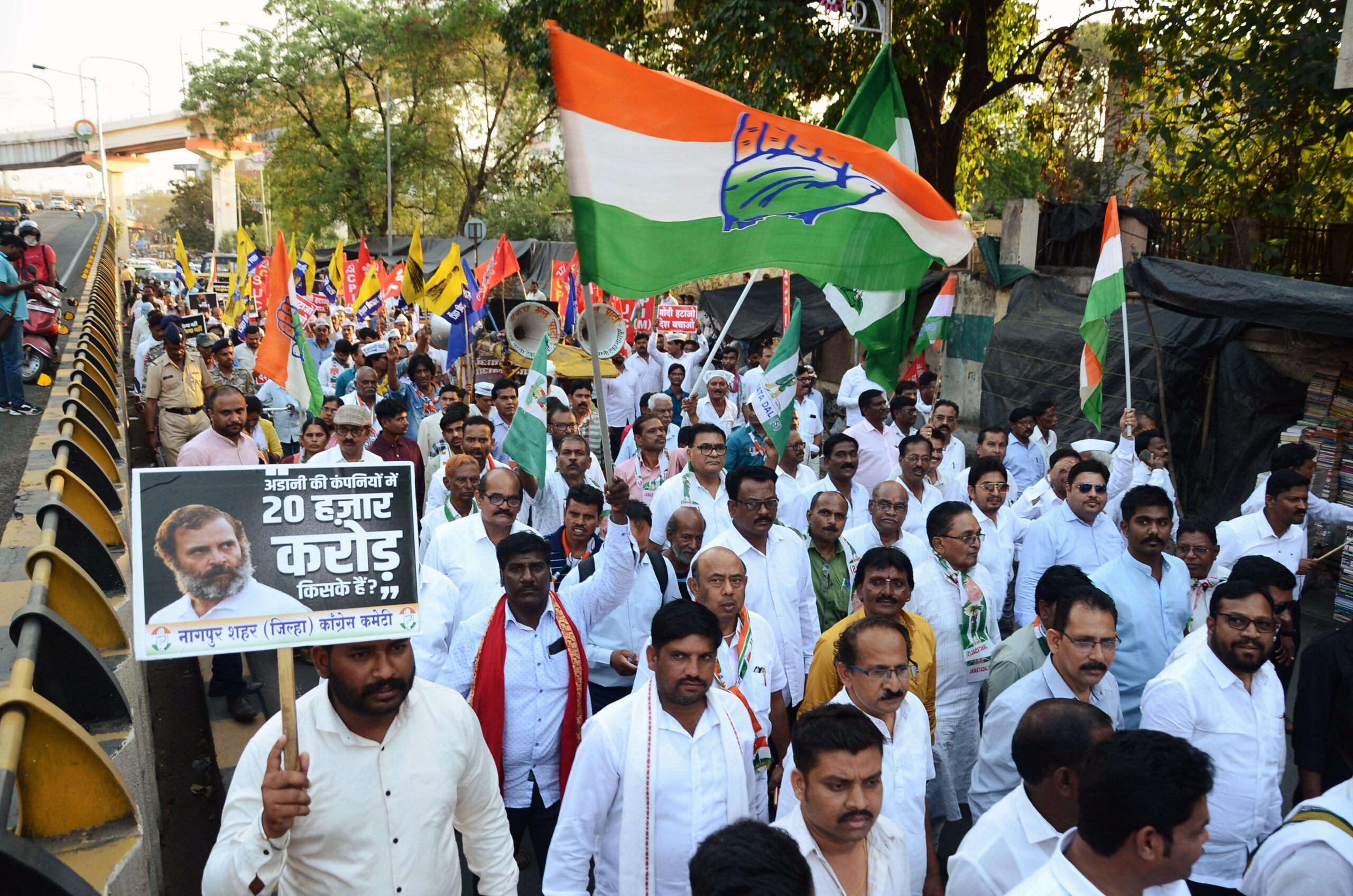 Congress, AAP and Left Front supporters protest in support of Rahul Gandhi
