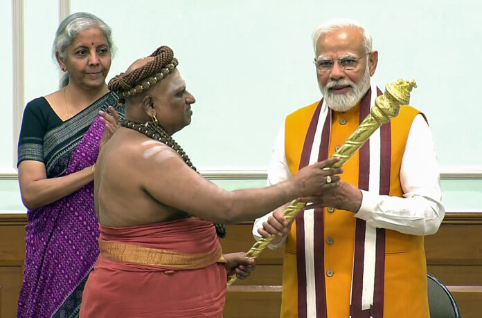 Sri Sri Ambalavanan Desika Paramacharya Swamigal handovers the 'Sengol' to Prime Minister Narendra Modi