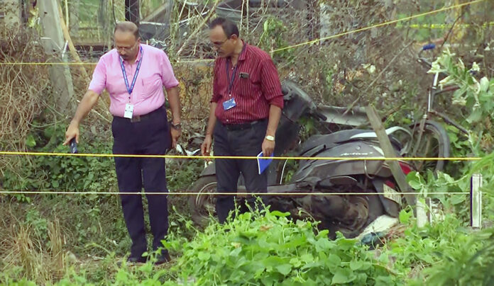 The Forensics team and a team of CID carry out their investigation at the explosion site of an illegal firecracker factory