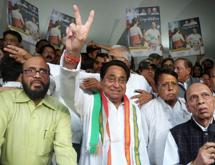 Kamal Nath celebrates the party's victory in Karnataka assembly polls in Bhopal