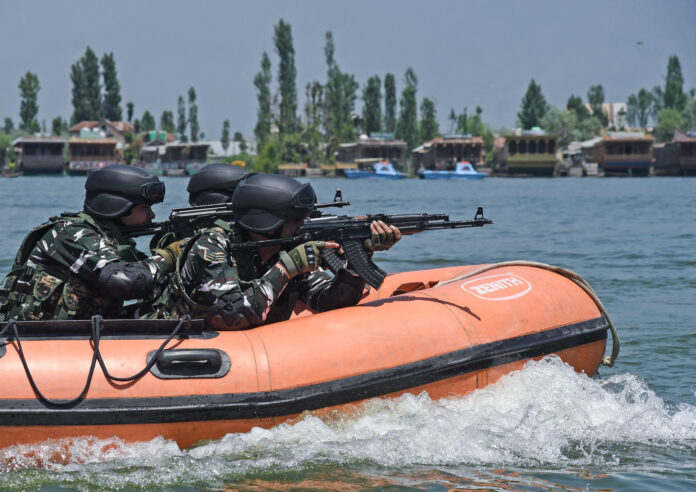 CRPF commandos conduct special security drill in the Dal Lake ahead of the G20 meeting