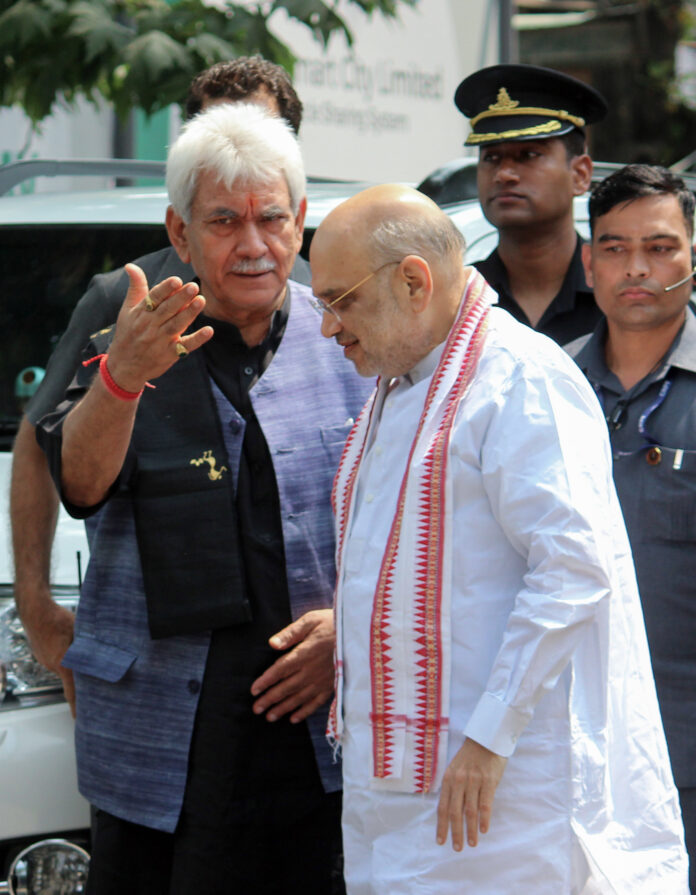 Union Home Minister Amit Shah along with J&K Lieutenant Governor Manoj Sinha arrives