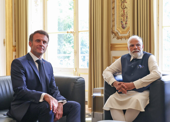 Narendra Modi with France President Emmanuel Macron during the Joint Press Statement