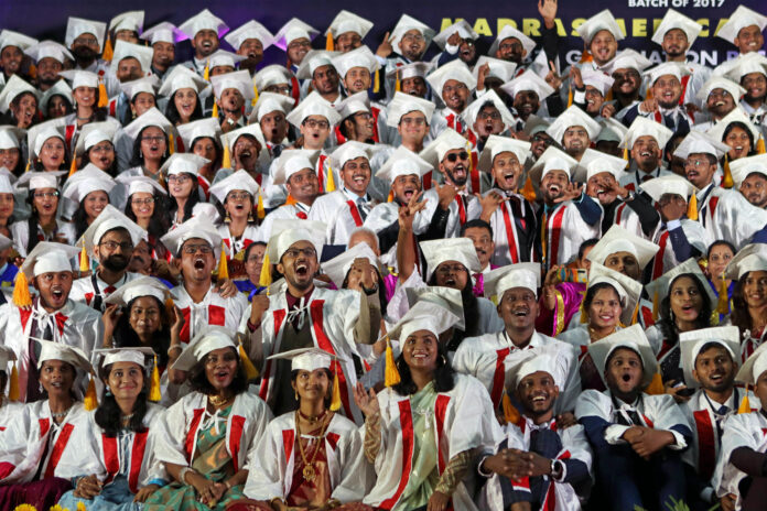 Outgoing students celebrate during the 187th graduation ceremony of Madras Medical College