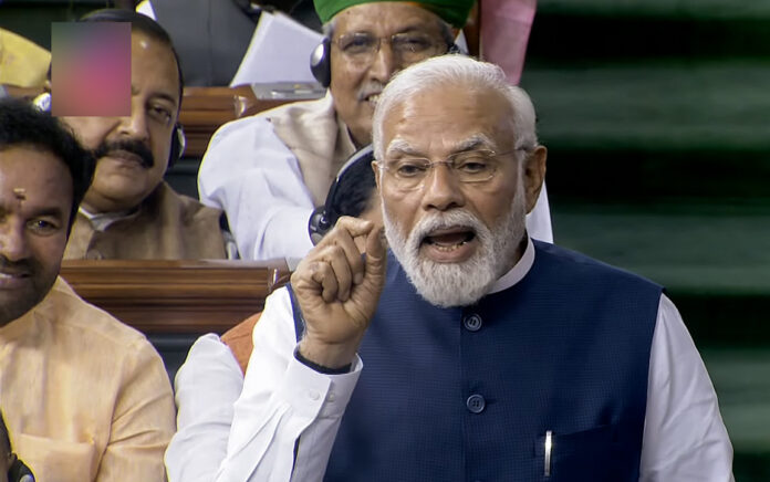 PM Narendra Modi speaks during a debate on the No Confidence Motion in the Lok Sabha