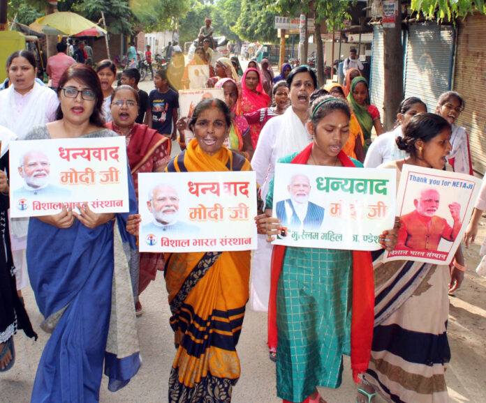 Women of Muslim Women's Foundation and Vishal Bharat Sansthan take part in a rally after the passing of Women's Reservation Bill