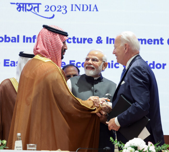 Prime Minister Narendra Modi shares a light moment with Joe Biden and Crown Prince