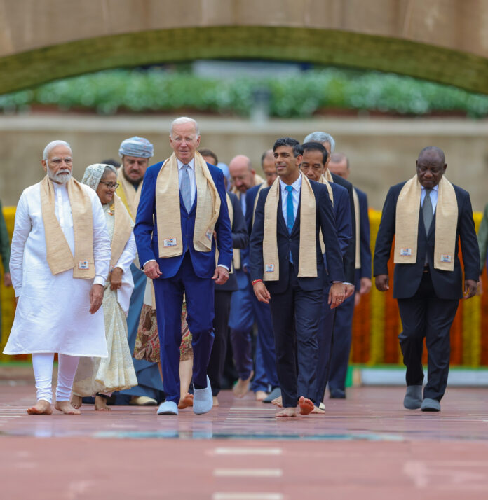PM Narendra Modi with US President Joe Biden and UK PM Rishi Sunak at Raj Ghat to pay homage to Mahatma Gandhi
