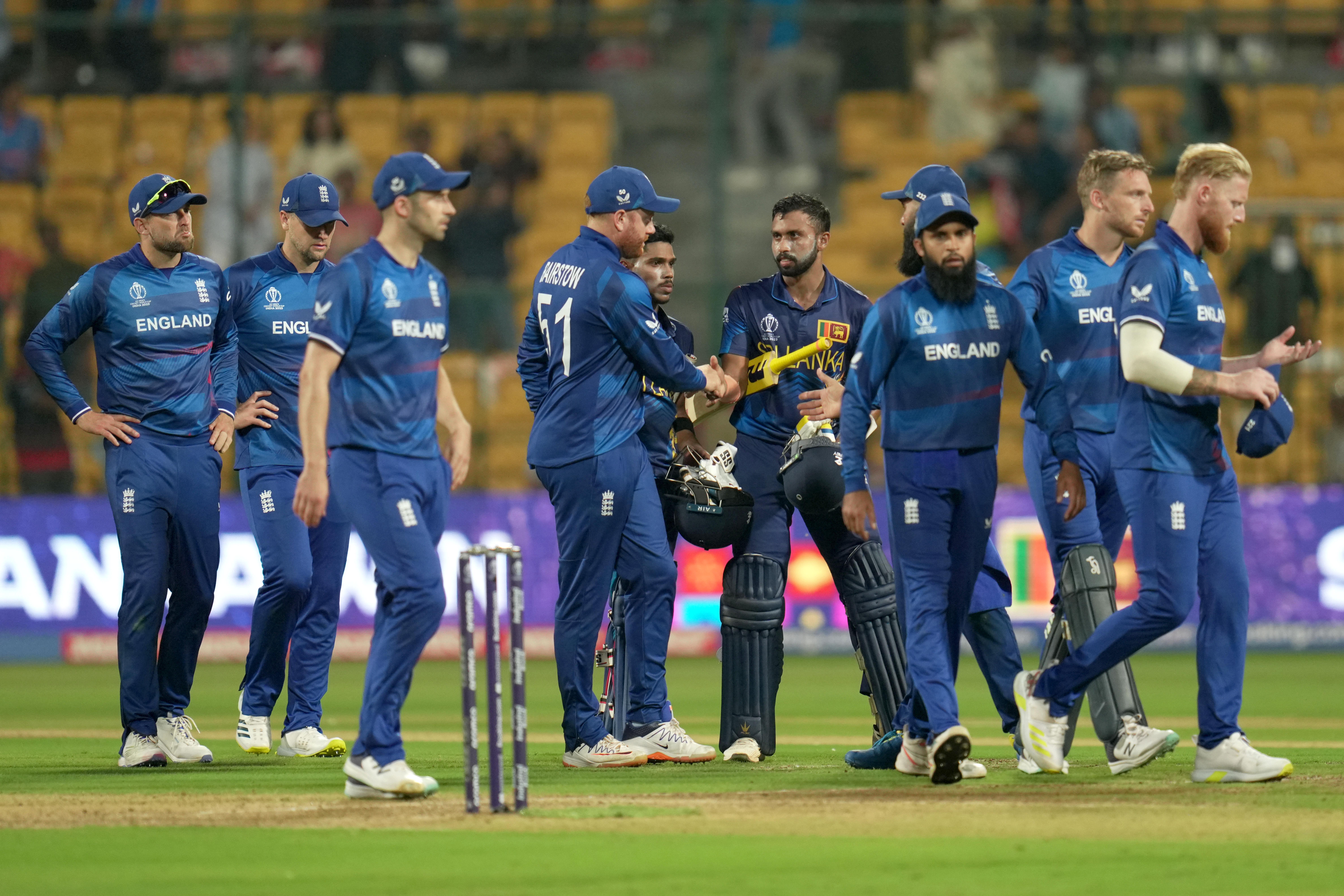 Sri Lanka and England players greet each other after their match