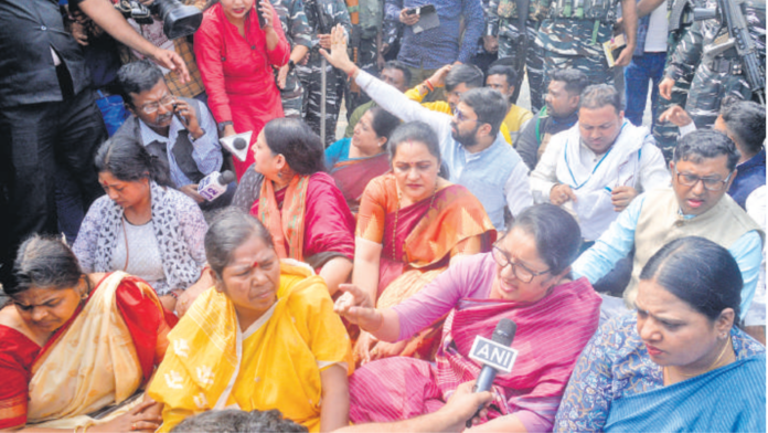 A 6-member Bharatiya Janata Party delegation constituted by party national president JP Nadda speaks to the media as they stage a sit-in protest after being barred by the police at Rampur on their way to Sandeshkhali to meet the victims, in North 24 Parganas on Friday. ANI A 6-member Bharatiya Janata Party delegation constituted by party national president JP Nadda speaks to the media as they stage a sit-in protest after being barred by the police at Rampur on their way to Sandeshkhali to meet the victims, in North 24 Parganas on Friday. ANI