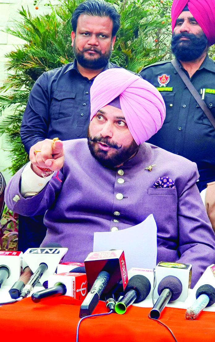 Navjot Singh Sidhu addresses a press conference
