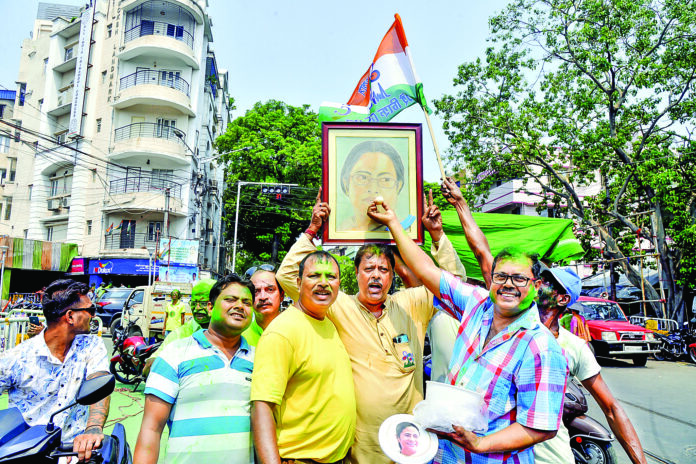 TMC supporters celebrate as initial trends show victory for the party candidates