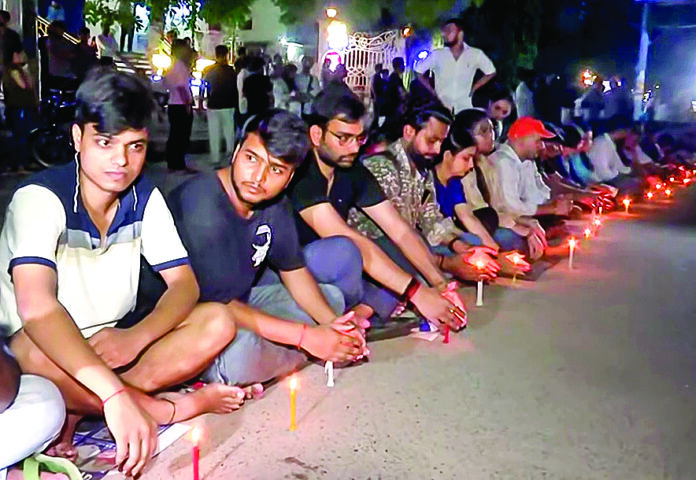 UPSC: Students observe a candlelight protest