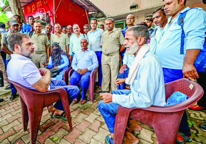 Rahul Gandhi interacts with DTC bus drivers