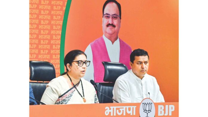 BJP leader Smriti Irani, along with BJP MP Anil Baluni, addresses a press conference at party headquarters in New Delhi, on August 2, 2024. ANI BJP leader Smriti Irani, along with BJP MP Anil Baluni, addresses a press conference at party headquarters in New Delhi, on August 2, 2024. ANI