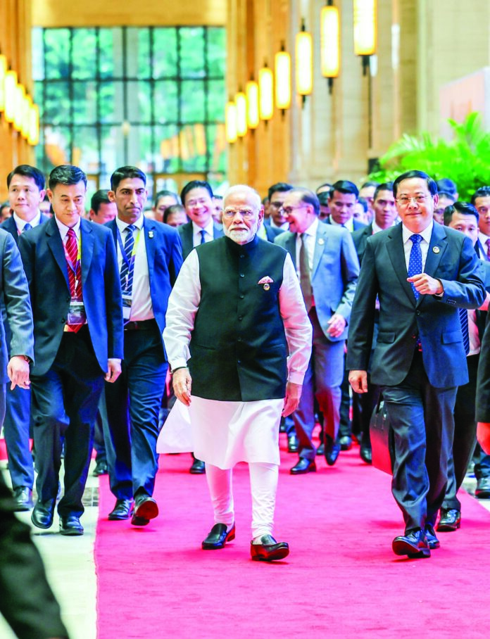 PM Modi with Laos Prime Minister Sonexay Siphandone, on the sidelines of the Indian-ASEAN Summit, in Vientiane on 11 Oct. ANI PM Modi with Laos Prime Minister Sonexay Siphandone, on the sidelines of the Indian-ASEAN Summit, in Vientiane on 11 Oct. ANI