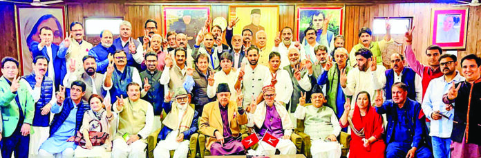 J&K NC President Farooq Abdullah, Party Vice President Omar Abdullah and party MLAs pose for a group picture in Srinagar on Thursday. ANI