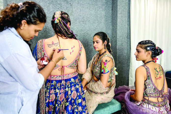 Representational photo: Women get their bodies inked with tattoos on the eve of the nine-day-long Navratri festival, in Surat on Wednesday. ANI Representational photo: Women get their bodies inked with tattoos on the eve of the nine-day-long Navratri festival, in Surat on Wednesday. ANI