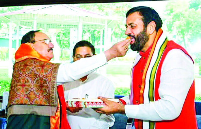 Union Minister and BJP National President JP Nadda offers sweets to Haryana CM Nayab Singh Saini following the party’s victory in the State Assembly elections, in New Delhi on Wednesday. ANI Union Minister and BJP National President JP Nadda offers sweets to Haryana CM Nayab Singh Saini following the party’s victory in the State Assembly elections, in New Delhi on Wednesday. ANI