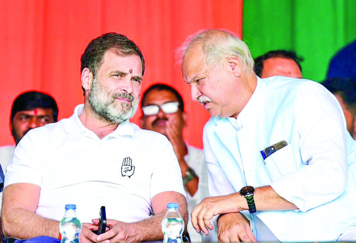 Leader of Opposition in Lok Sabha and Congress leader Rahul Gandhi with party leader Shakeel Ahmad Khan during a public meeting for the second phase of Jharkhand Assembly elections, in Godda on Friday. ANI Leader of Opposition in Lok Sabha and Congress leader Rahul Gandhi with party leader Shakeel Ahmad Khan during a public meeting for the second phase of Jharkhand Assembly elections, in Godda on Friday. ANI