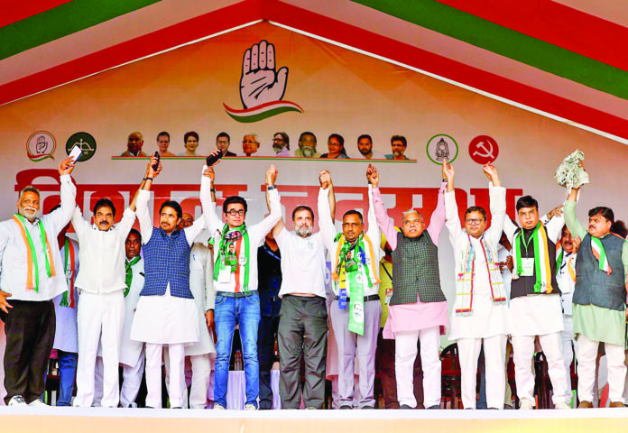 Congress MP & Lok Sabha LoP Rahul Gandhi joins hands with Jharkhand Congress in-charge Ghulam Ahmad Mir, party general secretary KC Venugopal and other party leaders during a public meeting for the Jharkhand Assembly elections, in Dhanbad on November 9. ANI Congress MP & Lok Sabha LoP Rahul Gandhi joins hands with Jharkhand Congress in-charge Ghulam Ahmad Mir, party general secretary KC Venugopal and other party leaders during a public meeting for the Jharkhand Assembly elections, in Dhanbad on November 9. ANI