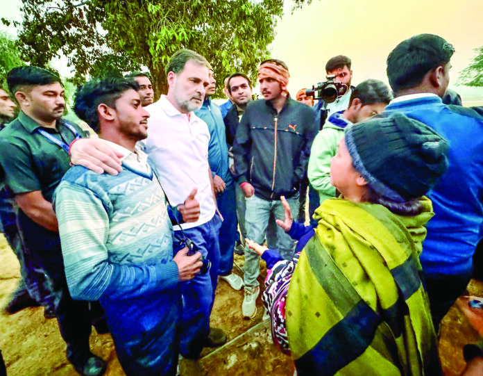 Leader of Opposition in Lok Sabha and Congress leader Rahul Gandhi meets with locals at India Gate to listen to their concerns about air pollution in the region, in New Delhi on Friday. ANI Leader of Opposition in Lok Sabha and Congress leader Rahul Gandhi meets with locals at India Gate to listen to their concerns about air pollution in the region, in New Delhi on Friday. ANI
