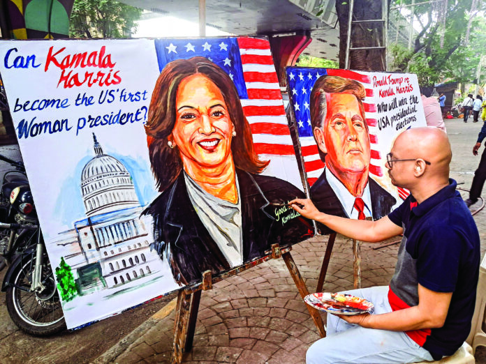 An artist draws portraits of US presidential candidates Kamala Harris and Donald Trump at the Gurukul School of Art ahead of the US Presidential elections, in Mumbai, on October 26. (ANI) An artist draws portraits of US presidential candidates Kamala Harris and Donald Trump at the Gurukul School of Art ahead of the US Presidential elections, in Mumbai, on October 26. (ANI)