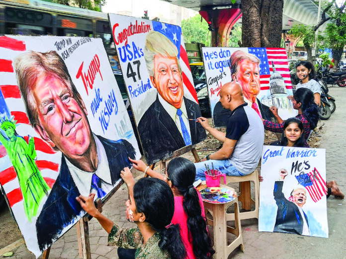 Representational photo: Artists draw portraits to congratulate Republican candidate Donald J. Trump on his victory in the US presidential election, in Mumbai on 6 November. ANI