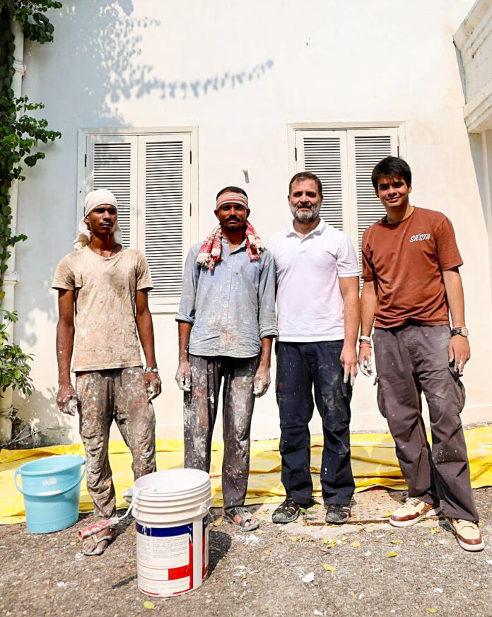 Congress leader Rahul Gandhi and his nephew Raihan Vadra helping in repair work at 10 Janpath in New Delhi on Friday. ANI Congress leader Rahul Gandhi and his nephew Raihan Vadra helping in repair work at 10 Janpath in New Delhi on Friday. ANI