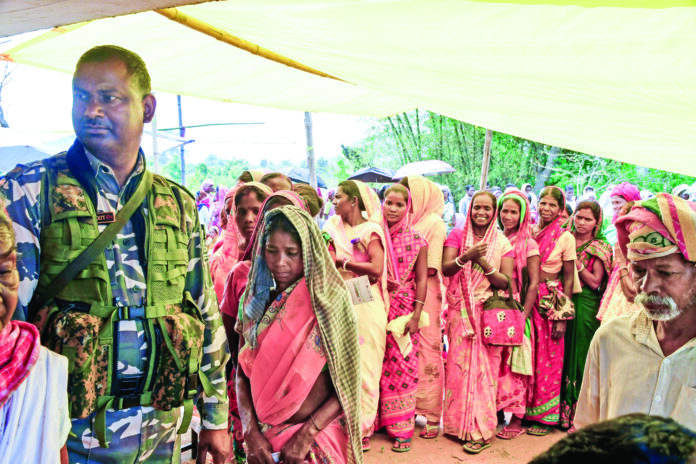 Tribal voters wait in queue to cast their vote for the fourth phase of the 2024 Lok Sabha elections, at a polling station in Khunti, Jharkhand on May 13. (ANI) Tribal voters wait in queue to cast their vote for the fourth phase of the 2024 Lok Sabha elections, at a polling station in Khunti, Jharkhand on May 13. (ANI)