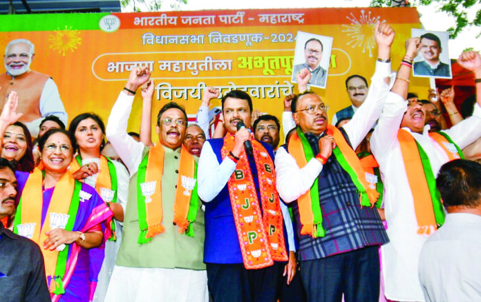 Maharashtra Deputy Chief Minister and BJP leaders Devendra Fadnavis during the celebrations following the victory of BJP-led Mahayuti in the State Assembly elections, at BJP HQ in Mumbai on Saturday. ANI Maharashtra Deputy Chief Minister and BJP leaders Devendra Fadnavis during the celebrations following the victory of BJP-led Mahayuti in the State Assembly elections, at BJP HQ in Mumbai on Saturday. ANI