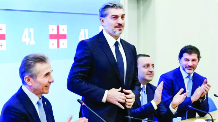 Mikheil Kavelashvili (standing) is known for his expletive-laden parliament speeches and tirades against government critics. (File Photo) Mikheil Kavelashvili (standing) is known for his expletive-laden parliament speeches and tirades against government critics. (File Photo)