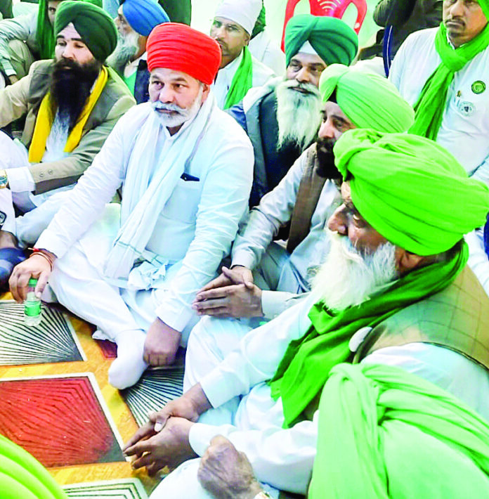 BKU leader Rakesh Tikait with other members stage a protest concerning the health situation of Punjab farmer leader Jagjit Singh Dallewal whose fast-unto-death entered the 18th day, at Khanauri Border in Sangrur on Friday. ANI BKU leader Rakesh Tikait with other members stage a protest concerning the health situation of Punjab farmer leader Jagjit Singh Dallewal whose fast-unto-death entered the 18th day, at Khanauri Border in Sangrur on Friday. ANI