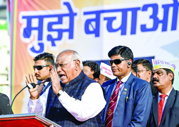 Congress President Mallikarjun Kharge addresses the ‘Samvidhan Bachao’ rally, in New Delhi on Dec 1 2024. ANI Congress President Mallikarjun Kharge addresses the ‘Samvidhan Bachao’ rally, in New Delhi on Dec 1 2024. ANI