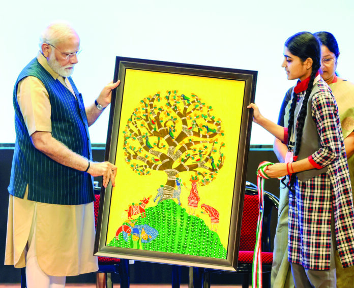 Prime Minister Narendra Modi being felicitated with a painting by a student at the inauguration of the ‘Akhil Bharatiya Shiksha Samagam’ in New Delhi on 29 July 2023. The event commemorated the third anniversary of NEP 2020. ANI Prime Minister Narendra Modi being felicitated with a painting by a student at the inauguration of the ‘Akhil Bharatiya Shiksha Samagam’ in New Delhi on 29 July 2023. The event commemorated the third anniversary of NEP 2020. ANI