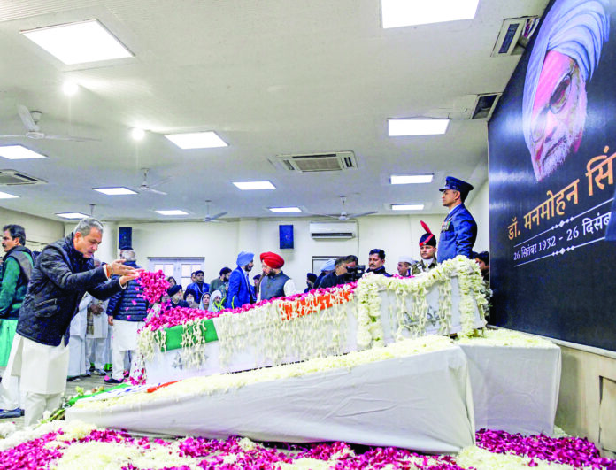 Congress leaders and supporters pay their last respects to the mortal remains of former Prime Minister Dr Manmohan Singh, at AICC headquarters, in New Delhi, on December 28. ANI Congress leaders and supporters pay their last respects to the mortal remains of former Prime Minister Dr Manmohan Singh, at AICC headquarters, in New Delhi, on December 28. ANI