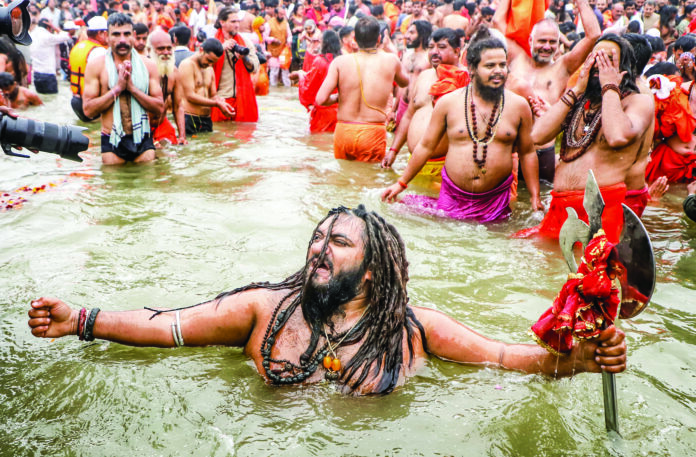 Sadhus take Amrit Snan at Triveni Sangam on Makar Sankranti during Maha Kumbh 2025, in Prayagraj on 14 January. ANI Sadhus take Amrit Snan at Triveni Sangam on Makar Sankranti during Maha Kumbh 2025, in Prayagraj on 14 January. ANI