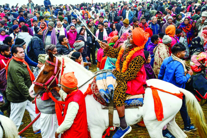 Devotees gather to take a dip at Triveni Sangam on Makar Sankranti during the ongoing Maha Kumbh 2025, in Prayagraj on 14 January. ANI Devotees gather to take a dip at Triveni Sangam on Makar Sankranti during the ongoing Maha Kumbh 2025, in Prayagraj on 14 January. ANI