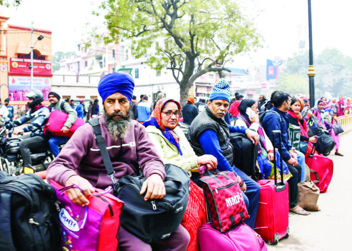 Devotees arrive to take Amrit Snan at Triveni Sangam on Makar Sankranti during Maha Kumbh 2025, in Prayagraj on 14 January. ANI Devotees arrive to take Amrit Snan at Triveni Sangam on Makar Sankranti during Maha Kumbh 2025, in Prayagraj on 14 January. ANI