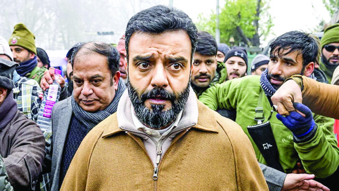 NC MP Aga Syed Ruhullah Mehdi leads a protest, advocating for the rationalisation of the reservation policy in J&K, near Chief Minister Omar Abdullah’s residence, in Srinagar, on December 23, 2024. NC MP Aga Syed Ruhullah Mehdi leads a protest, advocating for the rationalisation of the reservation policy in J&K, near Chief Minister Omar Abdullah’s residence, in Srinagar, on December 23, 2024.