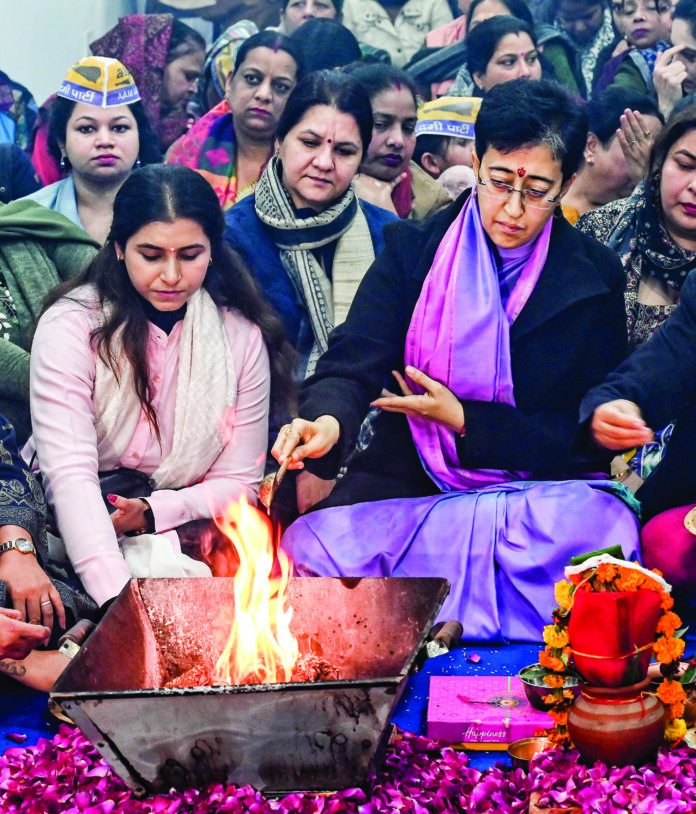 Delhi CM Atishi performs ‘havan’ during the inauguration of her new election office ahead of Delhi Assembly polls, at Kalkaji in New Delhi on Thursday, January 9. ANI Delhi CM Atishi performs ‘havan’ during the inauguration of her new election office ahead of Delhi Assembly polls, at Kalkaji in New Delhi on Thursday, January 9. ANI