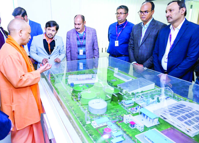 Uttar Pradesh Chief Minister Yogi Adityanath inspects the miniature model of bio CNG plant following its inauguration, in Prayagraj on 31 December 2024. ANI Uttar Pradesh Chief Minister Yogi Adityanath inspects the miniature model of bio CNG plant following its inauguration, in Prayagraj on 31 December 2024. ANI