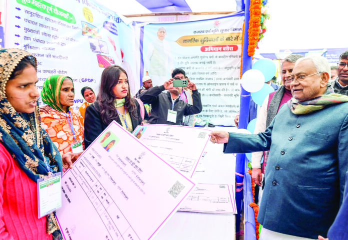 Bihar CM Nitish Kumar hands over a certificate of endowment of government land to a beneficiary during the ‘Pragati Yatra’, in Kishanganj, on January 21. ANI Bihar CM Nitish Kumar hands over a certificate of endowment of government land to a beneficiary during the ‘Pragati Yatra’, in Kishanganj, on January 21. ANI