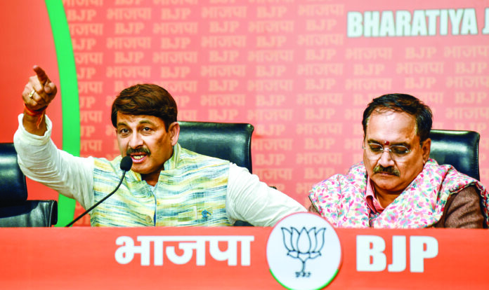 Delhi BJP President Virendra Sachdeva and Party MP Manoj Tiwari address a press conference at Delhi BJP office, in New Delhi, on January 9. ANI Delhi BJP President Virendra Sachdeva and Party MP Manoj Tiwari address a press conference at Delhi BJP office, in New Delhi, on January 9. ANI